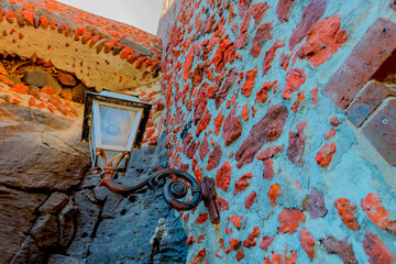 Wall Mural - Greece Santorini island in Cyclades, traditional view of white washed houses with colorful wooden frames