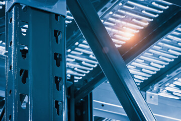 Fototapete - Warehouse racks metal dismountable constructions, modern warehouse technology background concept, vertical orientation, close-up with perspective, view from the bottom to top