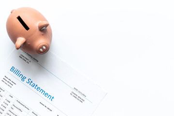 Wall Mural - Medical Billing Statement form with piggy bank. Medical care concept.