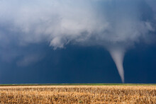 A Tornado Develops Beneath A Supercell Thunderstorm Near Bushnell, Nebraska.