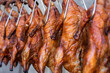 close up delicious roasted ducks hanging selected focus