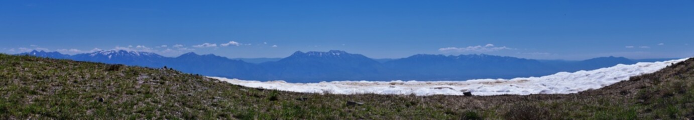 Wall Mural - Rocky Mountains Lowe Peak views of Oquirrh range toward Utah Lake, Timpanogos, Wasatch Front by Rio Tinto Bingham Copper Mine, in spring. Utah. United States. USA.