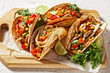 © myviewpoint - tacos with grilled chicken meat and veggies