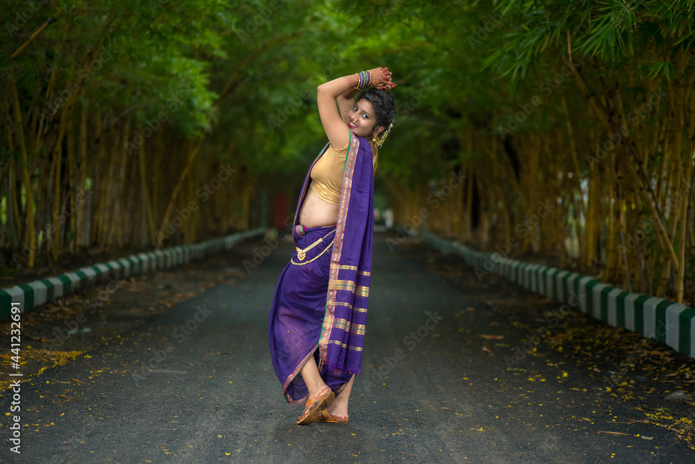 Indian Traditional Beautiful young girl in saree posing outdoors Stock ...