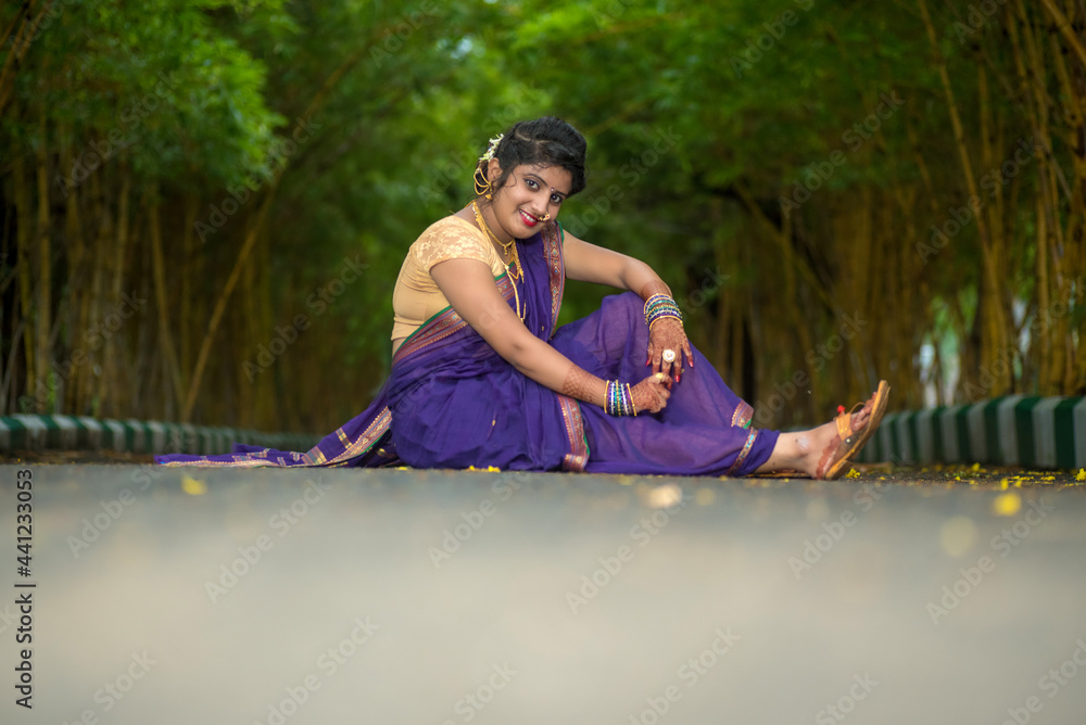 Indian Traditional Beautiful young girl in saree posing outdoors Stock ...