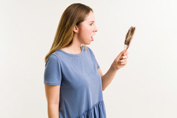 Wall Mural - Profile of a depressed woman losing hair