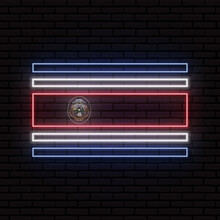 Neon Sign In The Form Of The Flag Of Costa Rica. Against The Background Of A Brick Wall With A Shadow. For The Design Of Tourist Or Patriotic Themes. North America