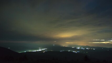 Wall Mural - night and dawn in the carpathian mountains in summer in the haze