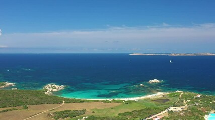 Wall Mural - View from above, stunning aerial view of a white sand beach bathed by a turquoise, clear water. Valle Dell’ Erica, Costa Smeralda, Sardinia, Italy.