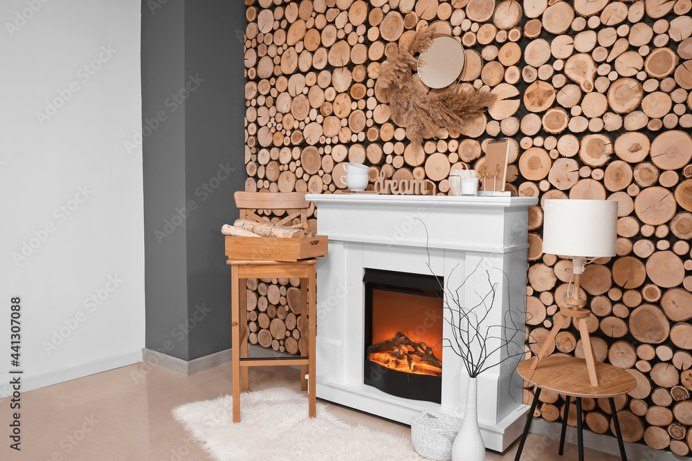 Stylish interior of modern living room with fireplace