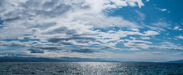Wall Mural - deep blue sky and white different types of clouds in it. beautiful nature background.