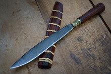 Knife Custom Or Enep In The Natural Wood Scabbard On Old Table Background Handmade Of Thailand