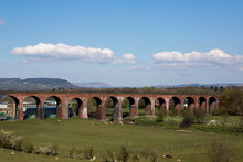 Whalley Arches. Red Brick Train Viaduct In The Ribble Valley. UK Railway Scene