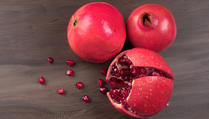 Fresh Pomegranate, rich in natural antioxidants. Concept of red fruits, vitamins and natural antioxidants to the skin for beauty.