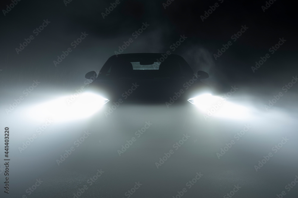 Modern LED Car Headlights in Dense Fog