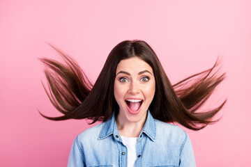 Sticker - Photo of positive nice happy young woman good mood smile hair fly isolated on pastel pink color background