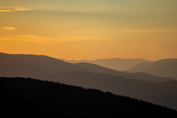 Wall Mural - beautiful orange sky during dusk in the carpathian mountains