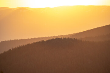 Wall Mural - beautiful orange sky during dusk in the carpathian mountains