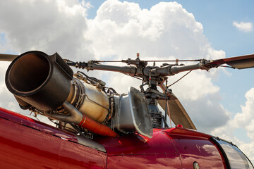 Wall Mural - Fragment of a helicopter. Helicopter propeller against a cloudy sky. Helicopter propeller. Part of copter rotor