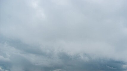 Wall Mural - thunderclouds in the sky over the mountains timelapse