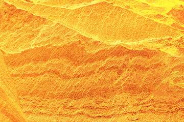 Gold stone texture for background. gold background