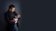 small baby crying, newborn baby with dad, on blue isolated background, selective focus