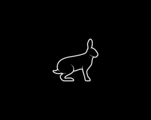 Wall Mural - Rabbit Silhouette on Black Background. Isolated Vector Animal Template for Logo Company, Icon, Symbol etc