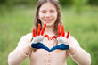 © Svetlana - Croatia flag painted on child hands. Girl show heart shape gesture, focus on hands. Patriotic holiday. Independence Day, flag day, 25 June. Selective focus. Croatia Independence Day concept. Victory
