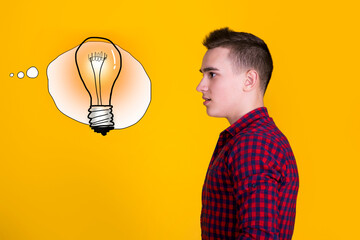 A handsome guy in a red shirt with a bulb on a yellow background in a comic style