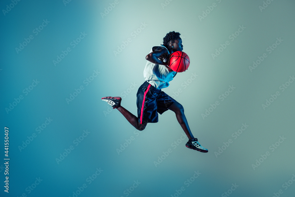Studio Shot Of Basketball Player In The Studio
