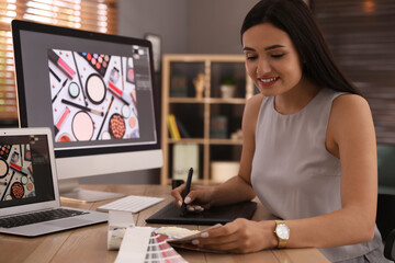 Poster - Professional retoucher working on computer in office