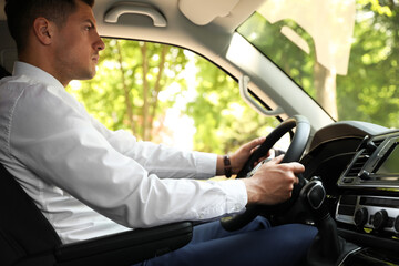 Poster - Handsome man driving his modern luxury car