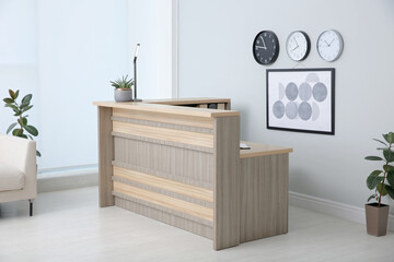 Wall Mural - Lobby interior with stylish wooden receptionist desk