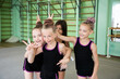 Girls gymnast having fun before training in gym