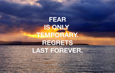 Wall Mural - Inspirational and motivational concept - Fear is only temporary. Regrets last forever.