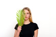 © ako-photography - portrait of a pretty young female with fern branch at her face, isolated over white background