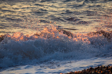 Wall Mural - Amazing sea sunset, the sun, waves, clouds