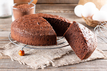 Wall Mural - Photo of delicious chocolate sponge cake on table