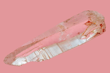 Wall Mural - Mountain quartz crystal on a pink background. Mineralogy object.
