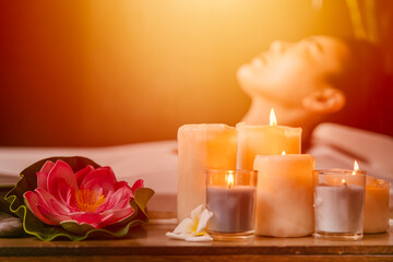 Beautiful women in beauty Spa salon calm relax resting with aroma scent candle for body healthcare with bright light shine.