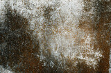 Fototapeta  -  Porysowana, skorodowana tekstura, tło starego muru ogrodzeniowego. Kolory korozji w stonowanych odcieniach szarości.