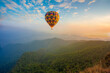 © banjongseal324 - mountains and balloons,Colorful hot air balloons flying over mountain at Dot Inthanon in Chiang Mai, Thailand