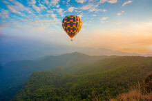 Mountains And Balloons,Colorful Hot Air Balloons Flying Over Mountain At Dot Inthanon In Chiang Mai, Thailand