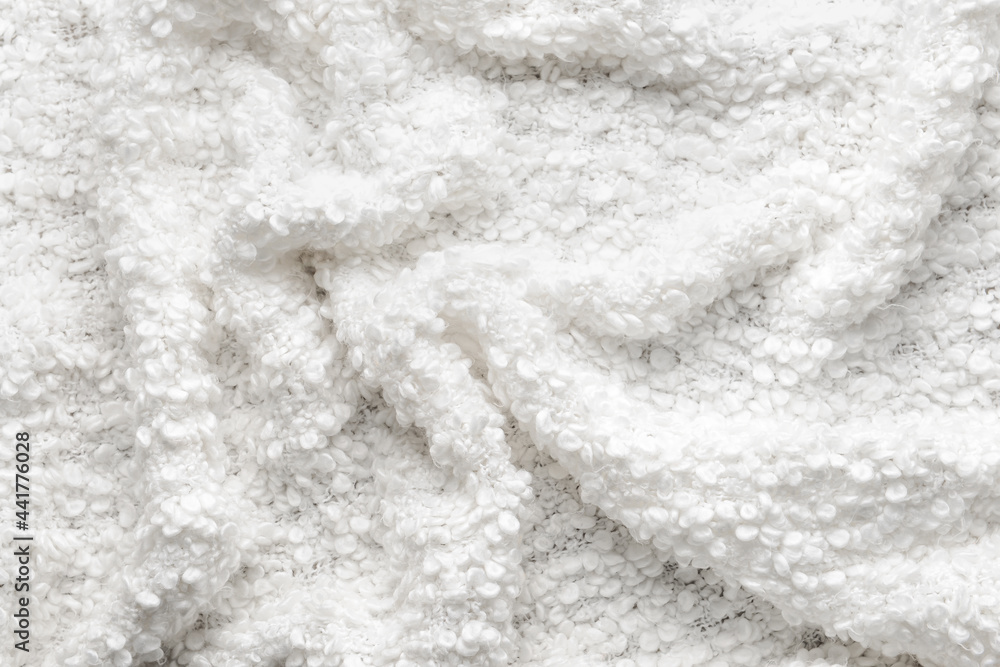 Texture of white fluffy fabric, closeup