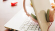 © Manolo Ramos - computer, headphones and highlighters on a wooden table to study or work at home or in the office in peace.