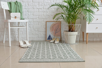 Sticker - Stylish rug in interior of modern hallway