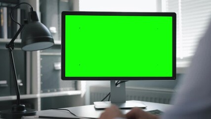 Wall Mural - Green screen of office computer