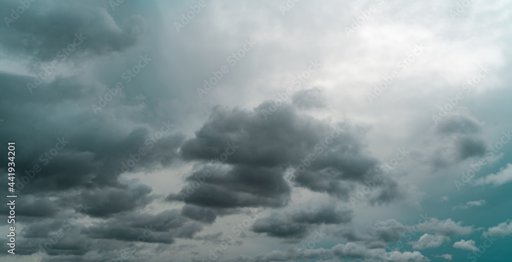 Panorama view of overcast sky. Dramatic gray sky and dark clouds before rain in the rainy season. Cloudy and moody sky. Storm sky. Cloudscape. Gloomy and moody background. Overcast clouds. - obrazy, fototapety, plakaty 