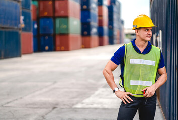 Wall Mural - Professional engineer container cargo foreman in helmets working standing and using walkie talkie checking stock into container for loading.logistic and business export