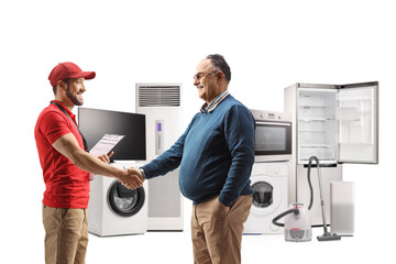 Sticker - Shop assitant and a mature man doing handshake with electircal appliances in the back